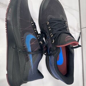 Nike Black and Blue Athletic Shoes with Sporty Design